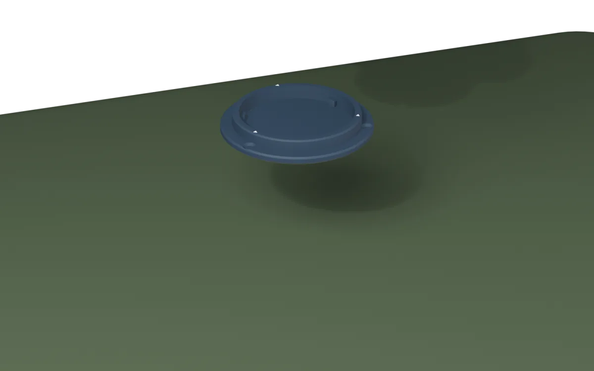 The round Levly mount plate dropping onto the lid of a green plastic oil tank
